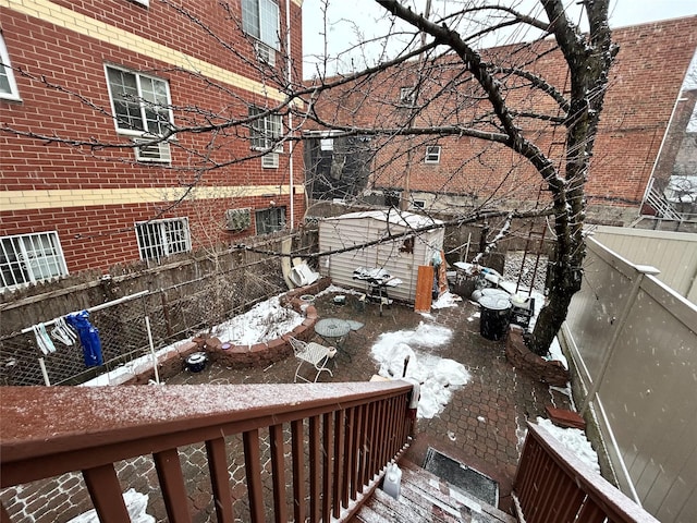 view of yard layered in snow