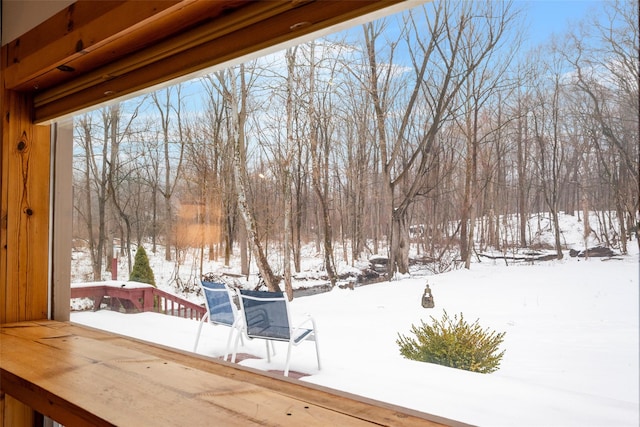 view of snow covered deck