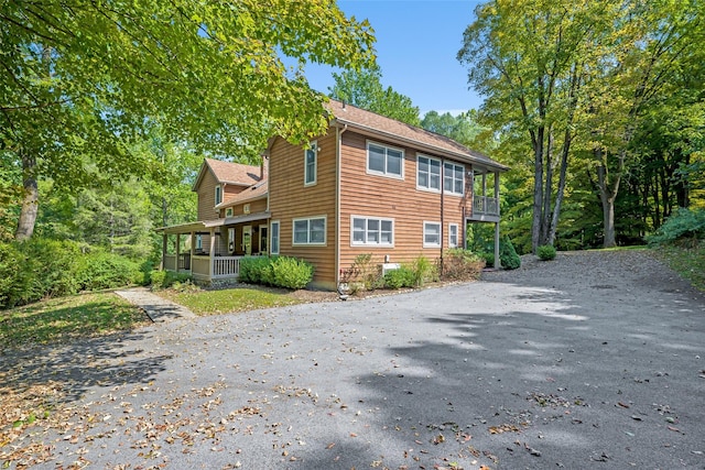 view of home's exterior featuring covered porch