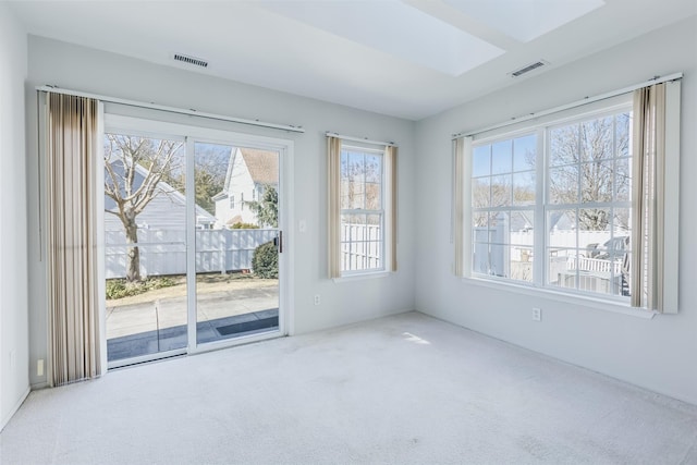 interior space featuring carpet floors and visible vents