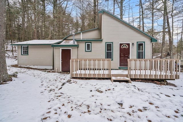 view of front of property featuring a wooden deck