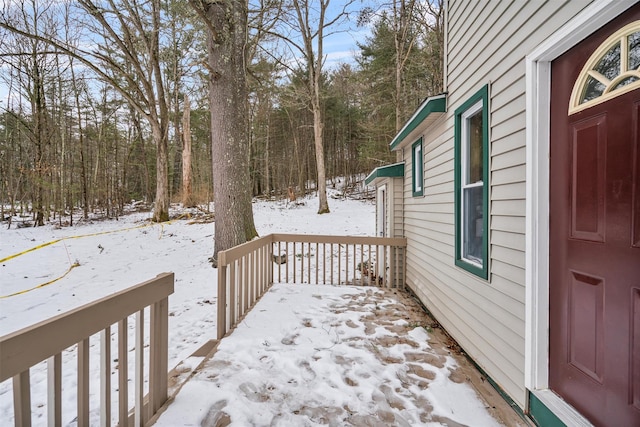 view of snow covered deck