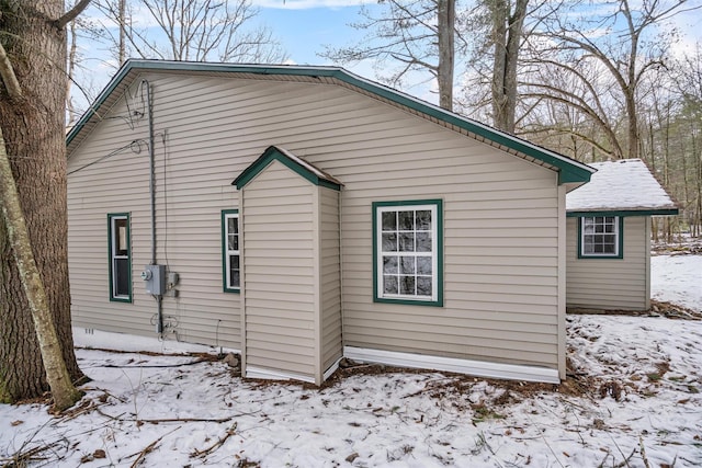 view of snow covered property