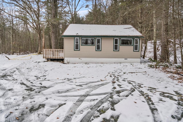 view of front of house with a deck