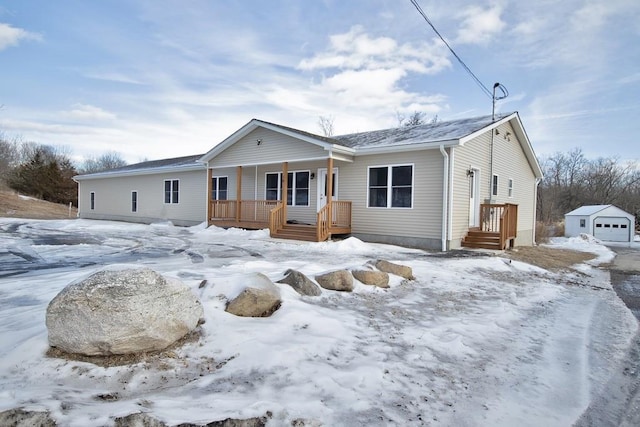 view of front of house featuring a garage and covered porch