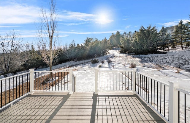 view of snow covered deck