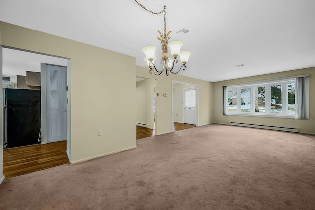 interior space with baseboard heating, dark carpet, a baseboard radiator, and a notable chandelier