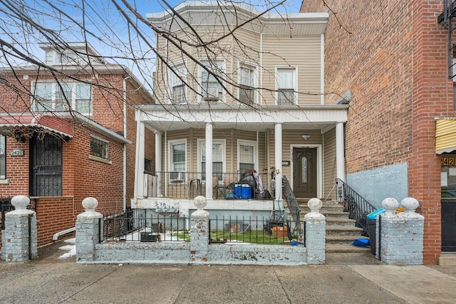 multi unit property featuring covered porch