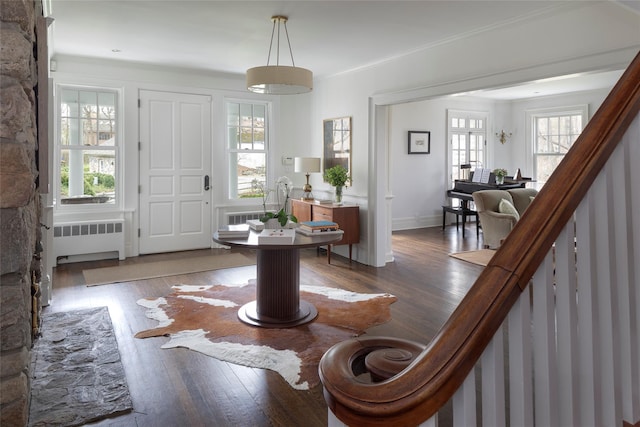 500 Hardscrabble Rd, Briarcliff Manor, NY 10510 - entryway featuring crown molding, radiator heating unit, wood finished floors, and baseboards