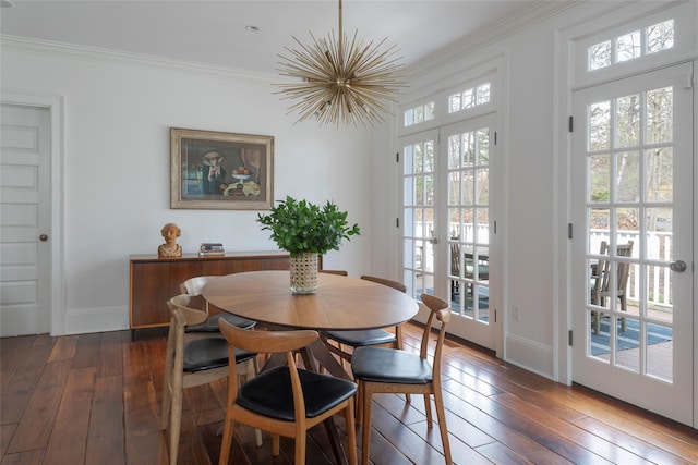 500 Hardscrabble Rd, Briarcliff Manor, NY 10510 - dining area with dark wood-type flooring, a chandelier, crown molding, and baseboards