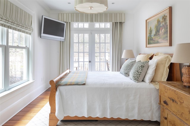 500 Hardscrabble Rd, Briarcliff Manor, NY 10510 - bedroom with access to outside, multiple windows, and crown molding