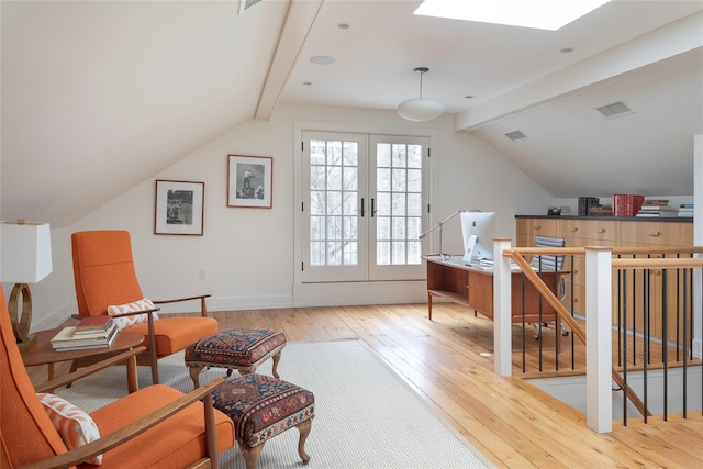 500 Hardscrabble Rd, Briarcliff Manor, NY 10510 - sitting room featuring lofted ceiling with beams, an upstairs landing, hardwood / wood-style flooring, visible vents, and french doors