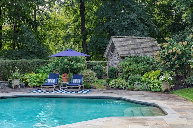 500 Hardscrabble Rd, Briarcliff Manor, NY 10510 - outdoor pool featuring an outdoor structure and a patio area