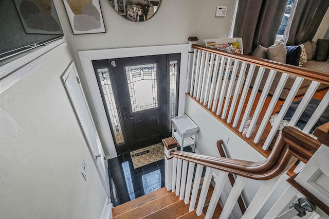 foyer featuring tile patterned flooring