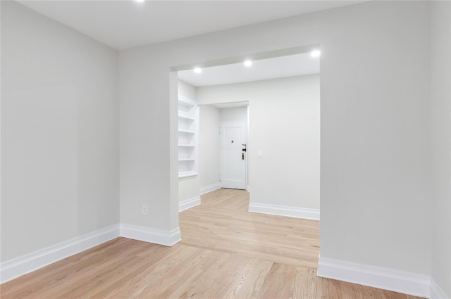 unfurnished room featuring light hardwood / wood-style flooring