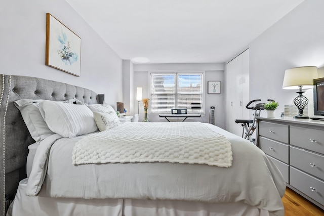 bedroom featuring light wood-type flooring