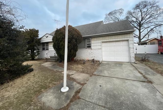 55 S Brookside Ave, Freeport, NY 11520 - ranch-style home featuring a garage