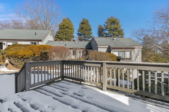 view of snow covered deck