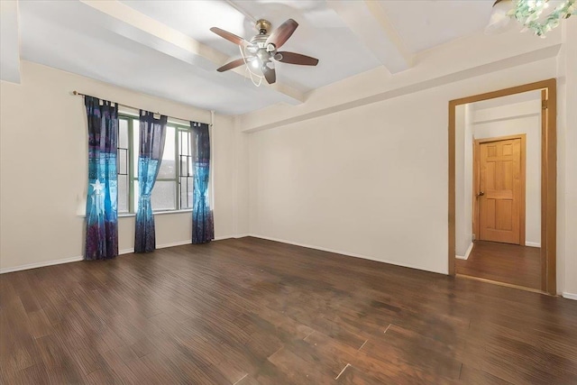 empty room with a ceiling fan, baseboards, dark wood finished floors, and beamed ceiling