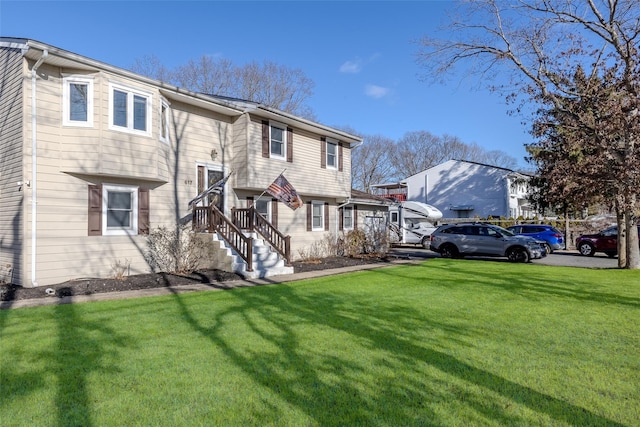 bi-level home with a front yard