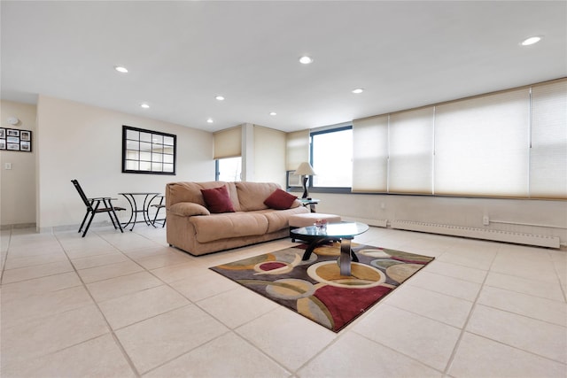 tiled living room with baseboard heating