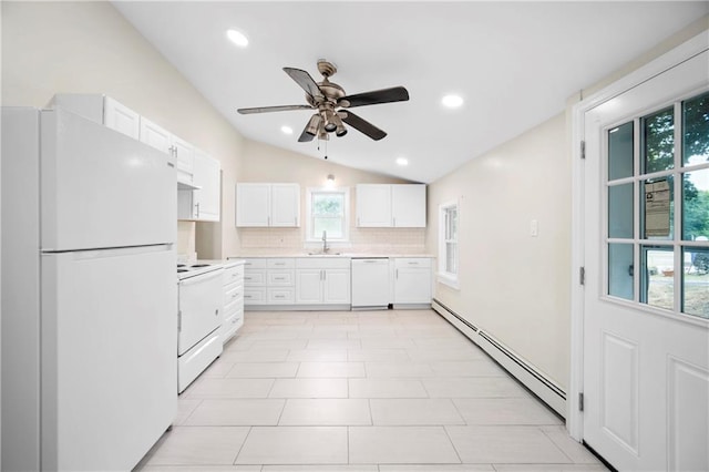 kitchen with white appliances, lofted ceiling, a baseboard radiator, light countertops, and a sink