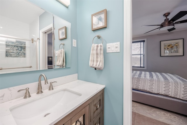 bathroom featuring vanity and ceiling fan