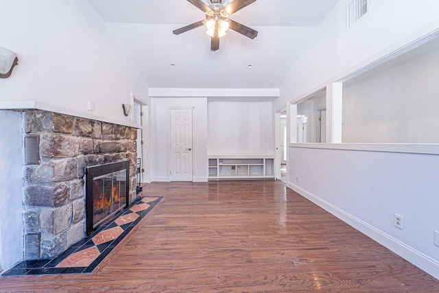 6 Mcgill Rd, Monroe, NY 10950 - unfurnished living room with lofted ceiling, a stone fireplace, dark wood-type flooring, and ceiling fan