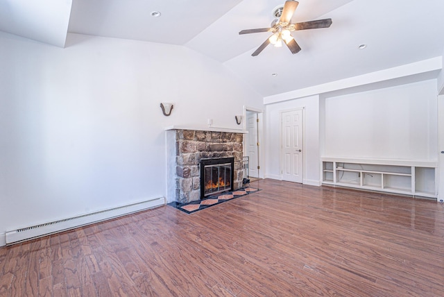 6 Mcgill Rd, Monroe, NY 10950 - unfurnished living room with lofted ceiling, baseboard heating, ceiling fan, a fireplace, and hardwood / wood-style floors