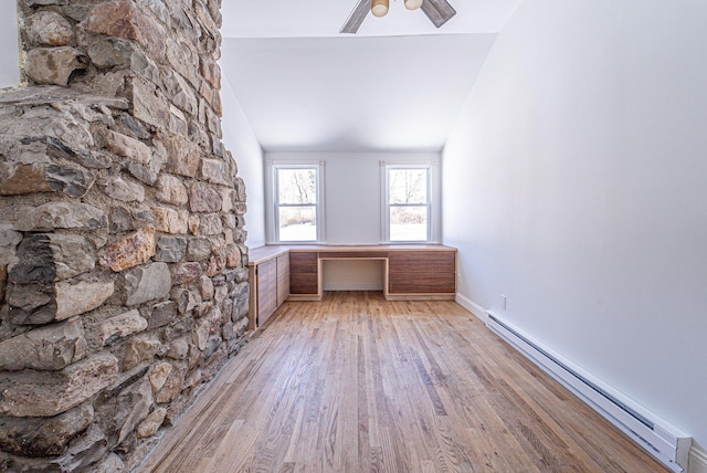 6 Mcgill Rd, Monroe, NY 10950 - unfurnished office featuring lofted ceiling, light hardwood / wood-style flooring, ceiling fan, built in desk, and a baseboard radiator