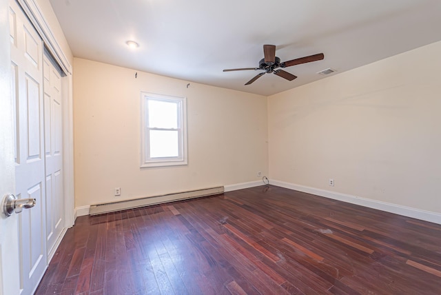 6 Mcgill Rd, Monroe, NY 10950 - unfurnished bedroom with a baseboard radiator, ceiling fan, dark hardwood / wood-style flooring, and a closet