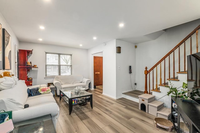 living room with light hardwood / wood-style flooring