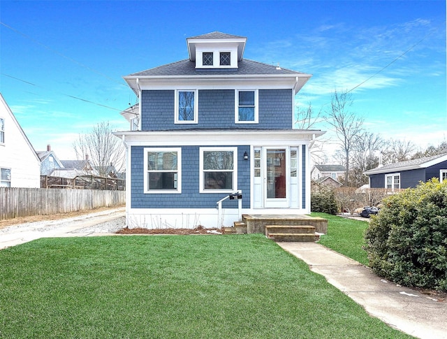 view of front property featuring a front yard