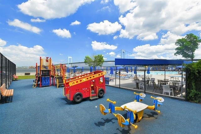 community play area featuring fence