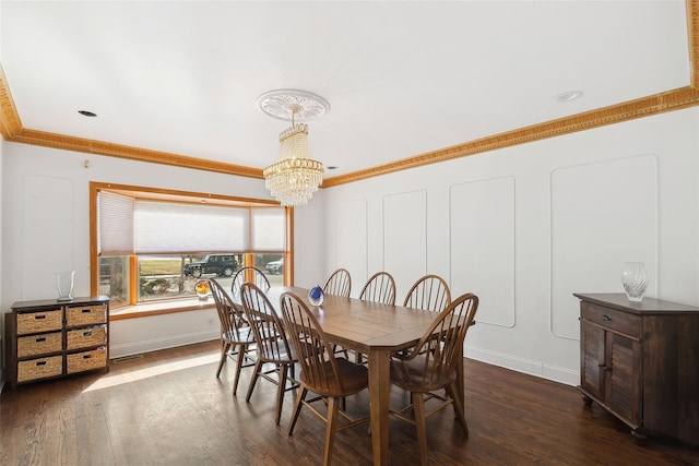 dining space with dark wood-style floors, baseboards, a notable chandelier, and crown molding