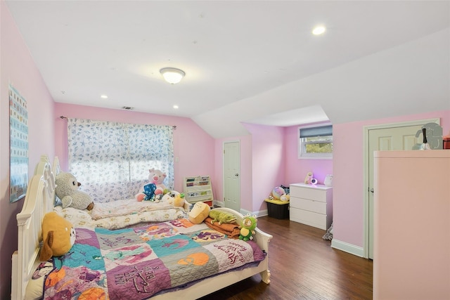 bedroom with washer / dryer, baseboards, dark wood finished floors, lofted ceiling, and recessed lighting