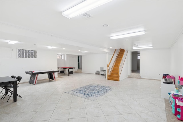 rec room featuring visible vents, baseboards, and light tile patterned floors