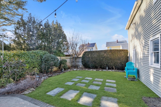 view of yard featuring a fenced backyard