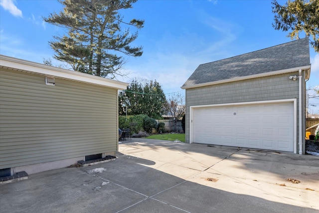 detached garage with fence