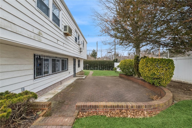 view of yard featuring a patio area and fence