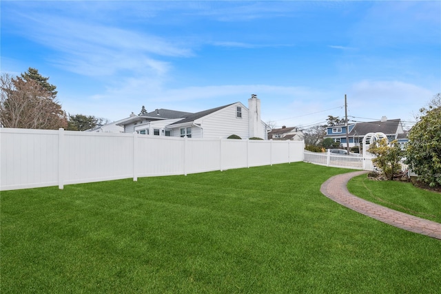 view of yard featuring a fenced backyard