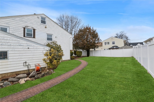 view of yard featuring a fenced backyard