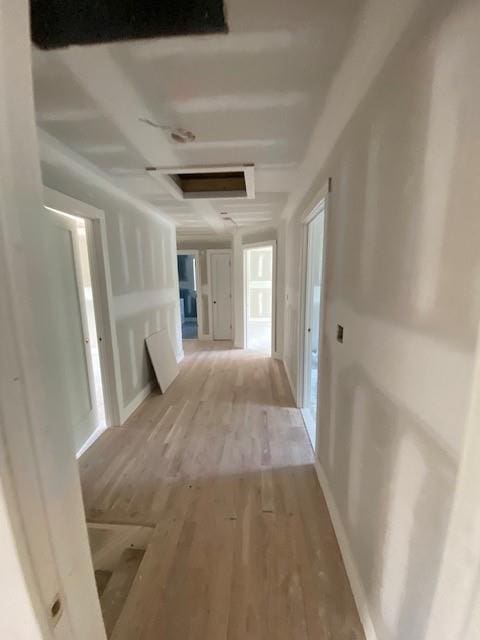 89 Leslie Rd, Newburgh, NY 12550 - hallway with attic access and light wood-style flooring