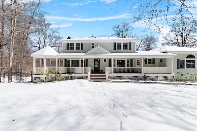 view of front of property featuring covered porch