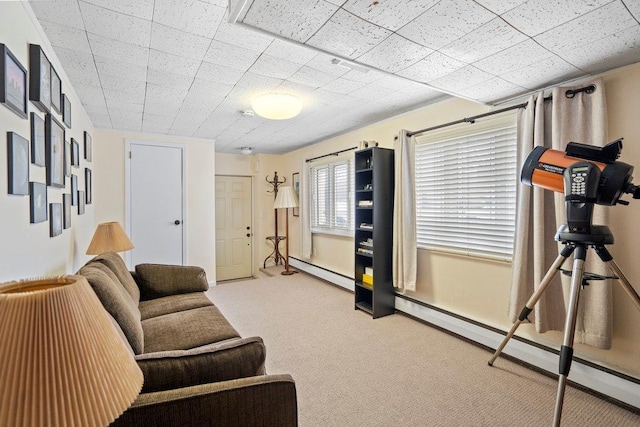 living area with carpet floors and a baseboard radiator