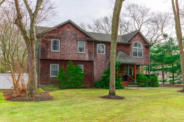 view of front of property with a front lawn