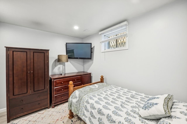 bedroom with recessed lighting