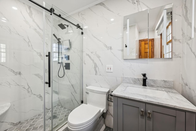 full bathroom featuring toilet, vanity, tile walls, ornamental molding, and a marble finish shower