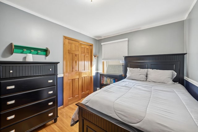 bedroom featuring light wood finished floors