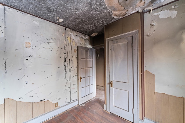 unfurnished room featuring dark hardwood / wood-style flooring